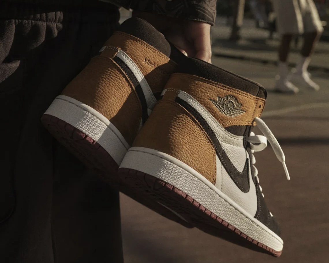 Shadow brown nubuck and suede high-top sneakers on a clean white surface showing earth-tone resale-ready colourway