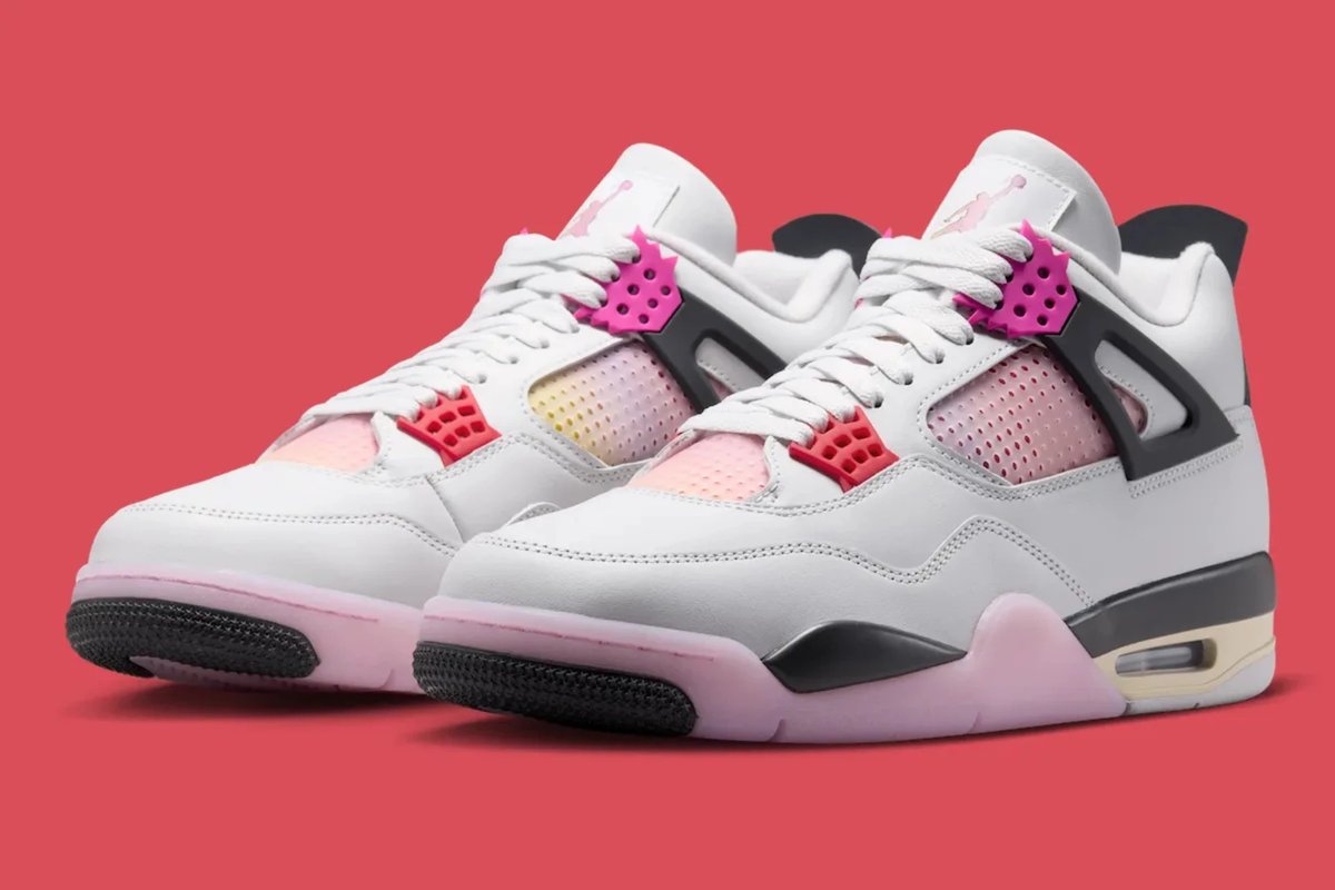 Pop-art coloured basketball sneakers with comic-book styling laid flat beside a matching retro graphic T-shirt on a grey surface