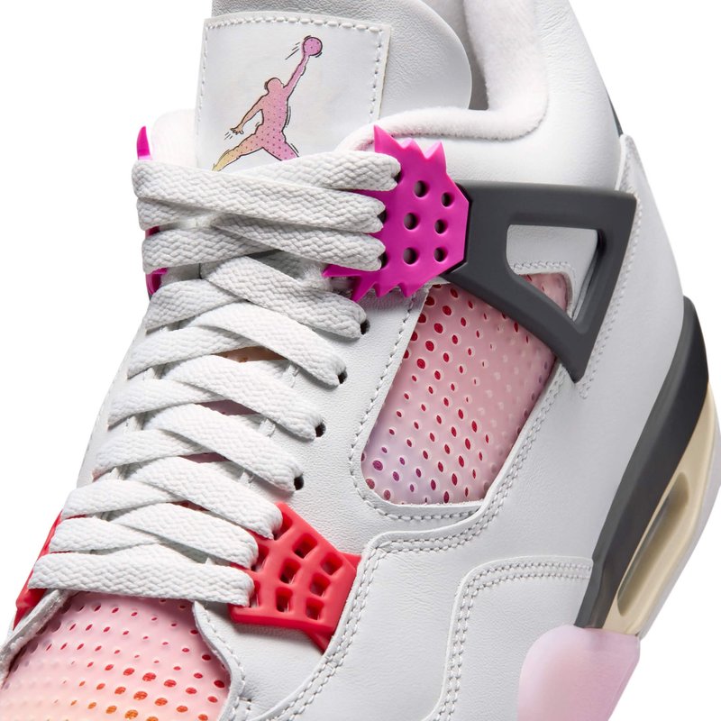 Close-up of bubble typography on the heel and aged midsole of a comic-book styled basketball sneaker