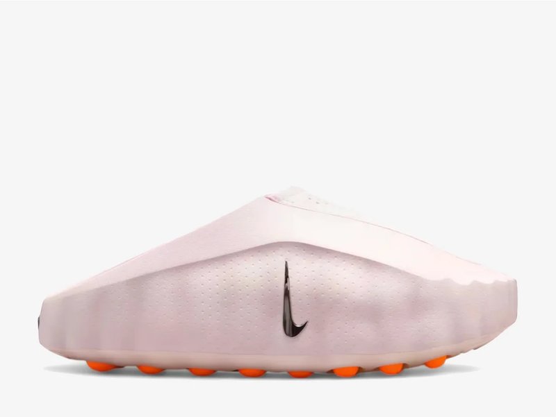 Detailed view of a recovery slide footbed showing raised sensory nodes, reflecting the Nike Mind 001 wellness-focused design